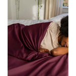 Load image into Gallery viewer, A woman is wrapped in a mulberry cotton throw duvet cover [44422682149083]
