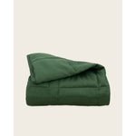 Load image into Gallery viewer, folded weighted blanket in spruce green against an empty background [44422820561115, 44422814826715, 44422813090011, 44422818234587, 45574418333915, 45574418235611, 45574418202843, 45574418235611, 45574418202843, 45574418301147]
