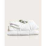 Load image into Gallery viewer, A folded weighted blanket with cotton buds on top. [429345878182031x]
