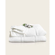 A folded weighted blanket with cotton buds on top. [42934587818203, 42934587850971, 42934587883739, 8503382081755, 45574417809627, 45574417940699,45574418071771, 45574418006235]