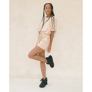 A woman stands up wearing cloud booties in black [43579501215963, 43579501248731, 43579501281499, 43579501314267]