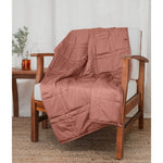 Load image into Gallery viewer, [44676999741659] a Hope Rose weighted blanket on a chair 
