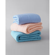 A stack of three folded weighted blankets in bright colors [37958782484664, 37958784286904, 37958784286904]