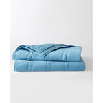 Load image into Gallery viewer, The aqua weighted blanket by baloo folded on a blank background [3795878428690-4]
