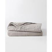 A folded silver sage blanket on a plain background. [42952280801499, 43631556591835, 43631556952283, 43631557968091,46061921337563, 46061921370331, 46061921403099, 46063267610843, 46063269019867]