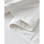Load image into Gallery viewer, Detailed image of white weighted blanket [42934587621595, 45574417809627, 42934587883739, 46452819001563, 42934587850971, 46452818444507, 42934587818203, 45574417940699]
