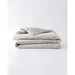 Load image into Gallery viewer, A silver sage cotton duvet cover folded against an empty background [44422682050779, 45027099771099,46061921337563,46061921468635,46061921599707,46061921730779,46063268298971]
