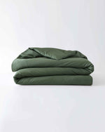 Load image into Gallery viewer, A folded cotton duvet cover in spruce against a plain background [44422682116315,46063268364507, 46061921796315, 46061921665243, 46061921534171, 46061921403099,46730800726235, 46730800857307, 46730800988379, 46730801119451]
