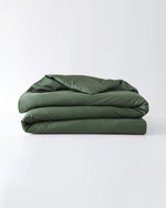 Load image into Gallery viewer, A folded cotton duvet cover in spruce against a plain background [44422682116315, 46063268364507, 46301204971739, 46061921796315, 46301205364955, 46061921665243, 46061921534171, 46301205233883, 46061921403099, 46301205102811, 46730786701531, 46730786963675, 46730787225819, 46730787487963]
