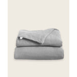 Load image into Gallery viewer, A folded linen duvet in dove grey [32783545598032, 32783545204816, 32783545401424, 32854363471952, 32854405513296]
