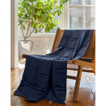 Load image into Gallery viewer, A soft cotton weighted blanket the color luna blue is draped across a chair in a home. [43649942782171,46089486074075]
