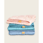 Load image into Gallery viewer, A stack of three folded weighted blankets in bright colors [44385363656923, 44385363722459, 44385363689691]
