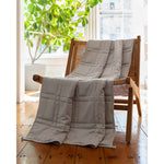 Load image into Gallery viewer, A silver sage weighted blanket on a chair. [43631556591835, 43631556952283]
