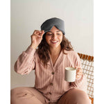 Load image into Gallery viewer, A woman with curly brown hair sits in a chair holding a mug, lifting the edge of a silk sleep mask up [44377020793051]
