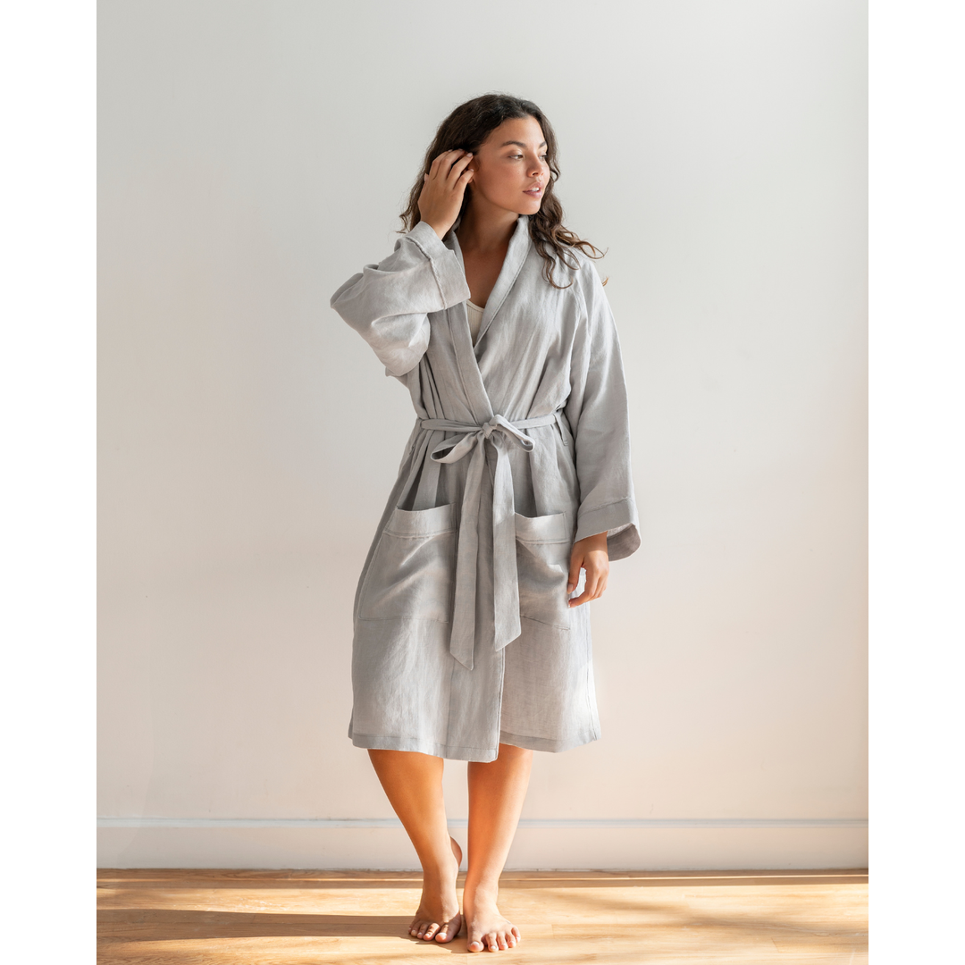 Woman in dove gray linen robe [45949480829147, 45949488103643]