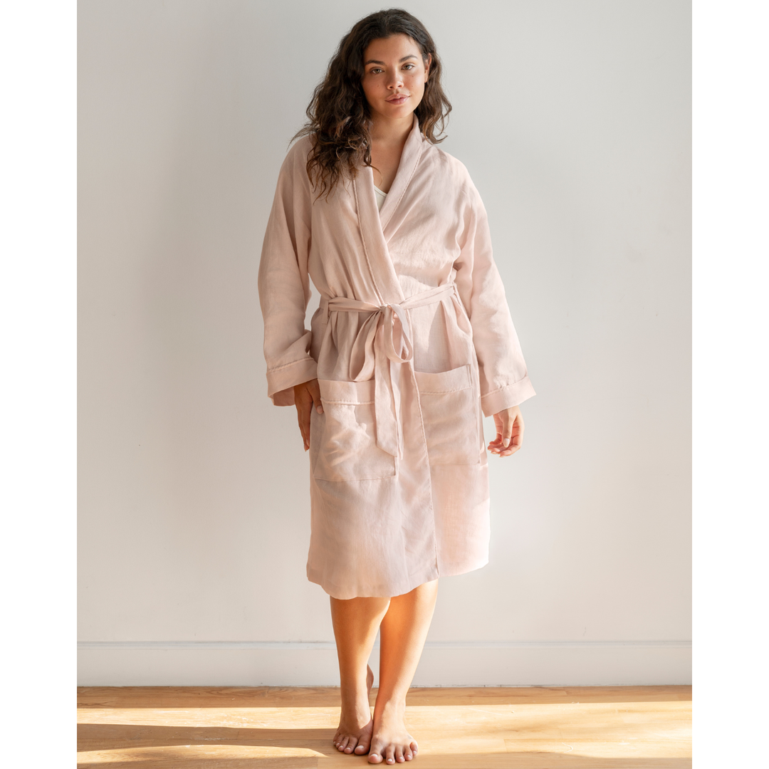 Woman in pink linen robe [45949488201947, 45949488234715]